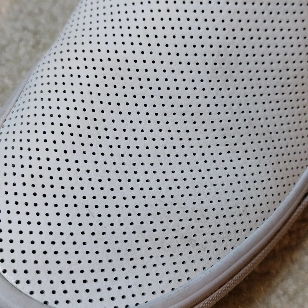 Vans men's white perforated leather slip on loafers. Size 5.5